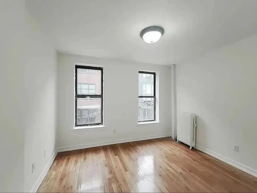 Large Manhattan apartment with bedroom with two windows