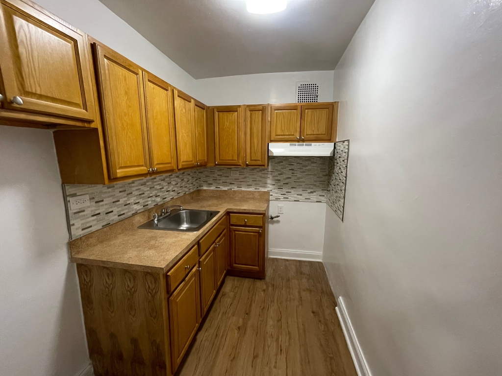 Kitchen with wooden cabinets