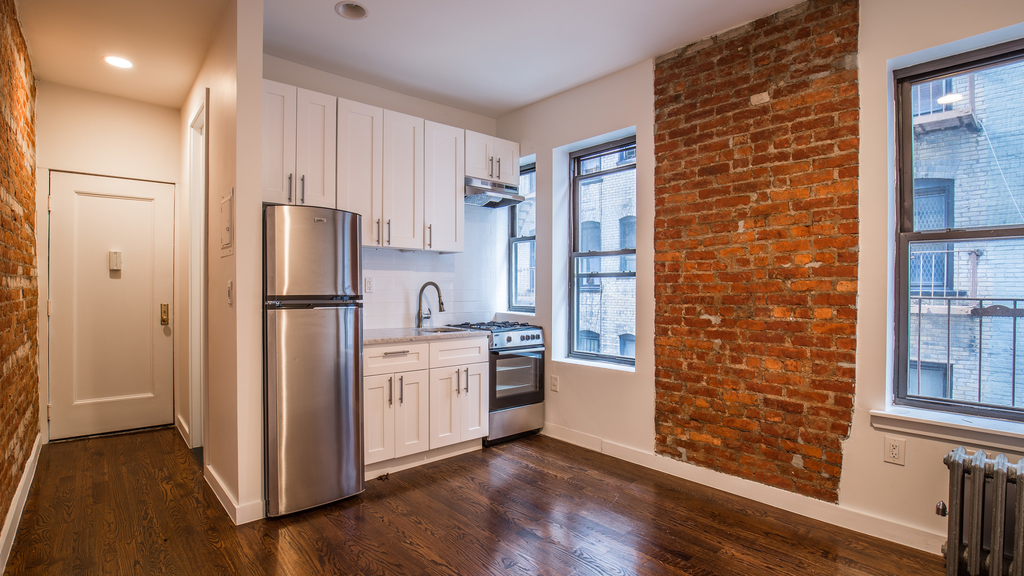 Brooklyn studio with exposed brick and large windows