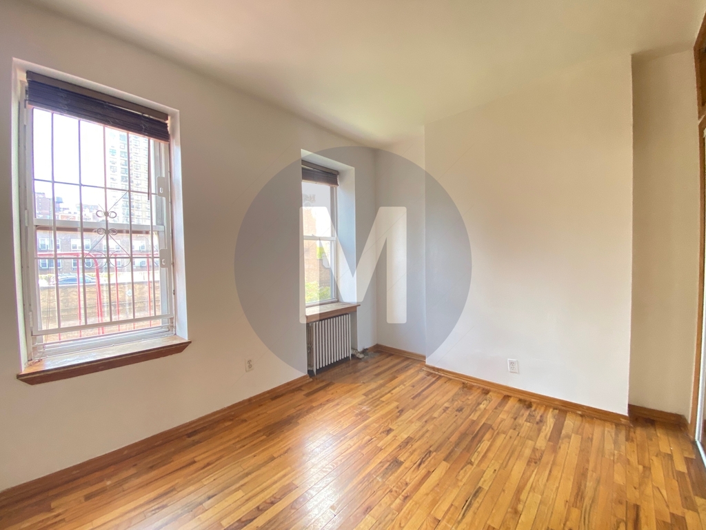 Manhattan bedroom with two windows
