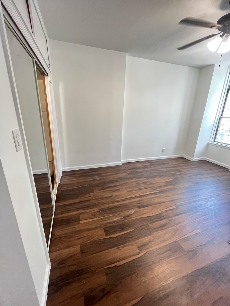 Brooklyn bedroom with hardwood floors