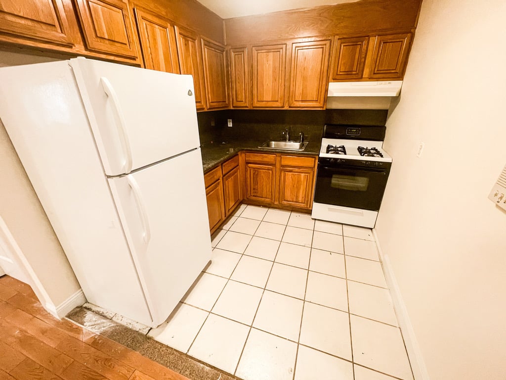 Queens kitchen with white appliances