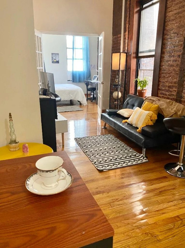 Manhattan living room with exposed brick