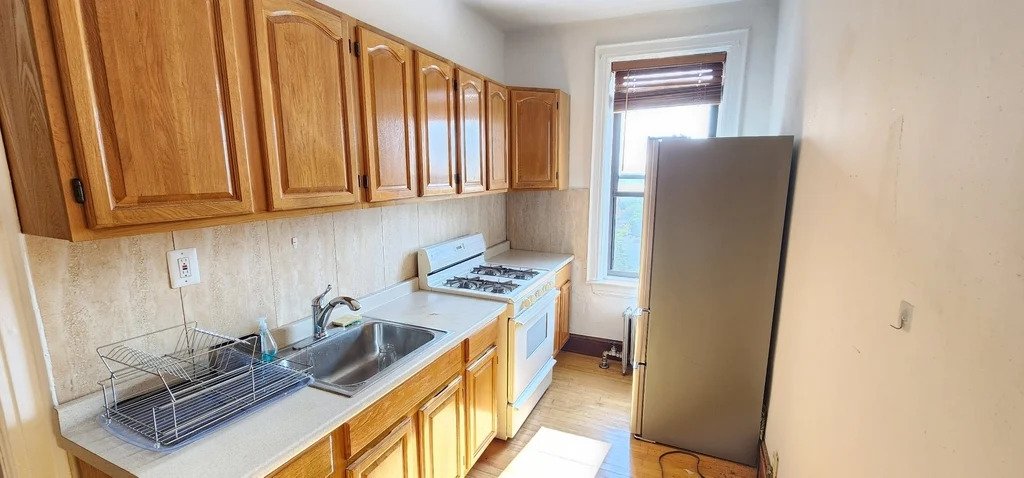 Brooklyn kitchen with stainless steel fridge