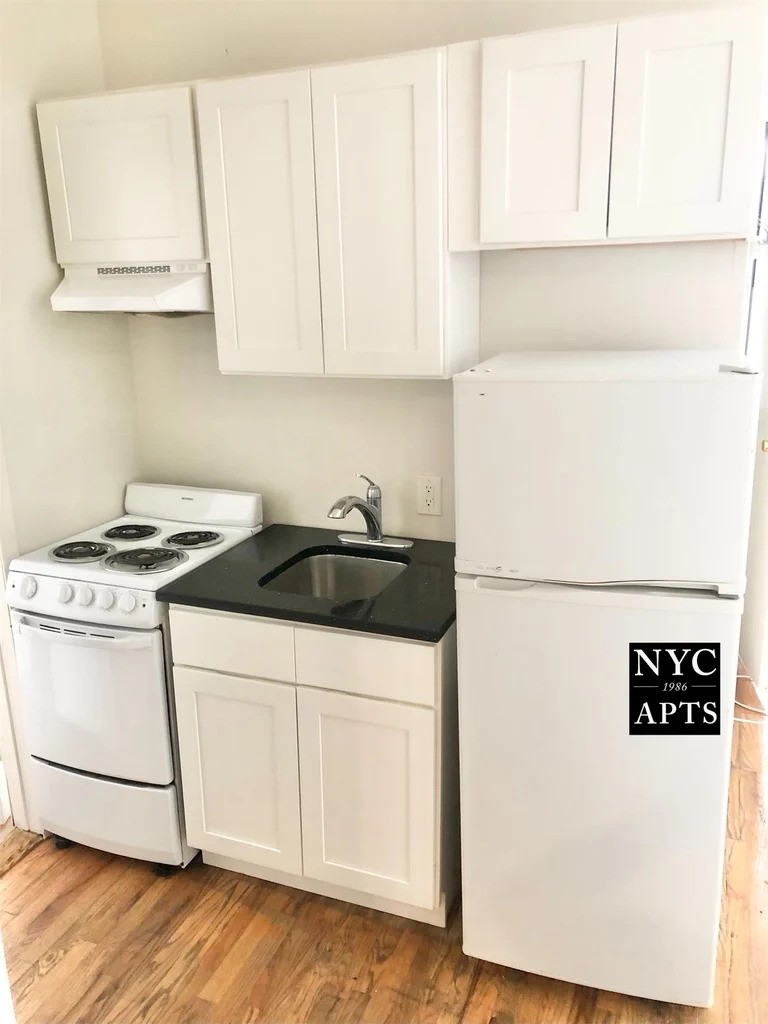 Manhattan kitchen with white appliances