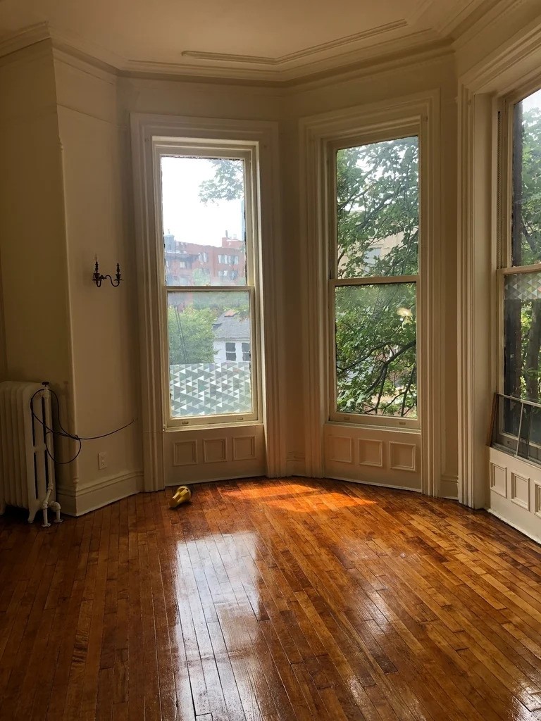 Brooklyn living room with a bay window