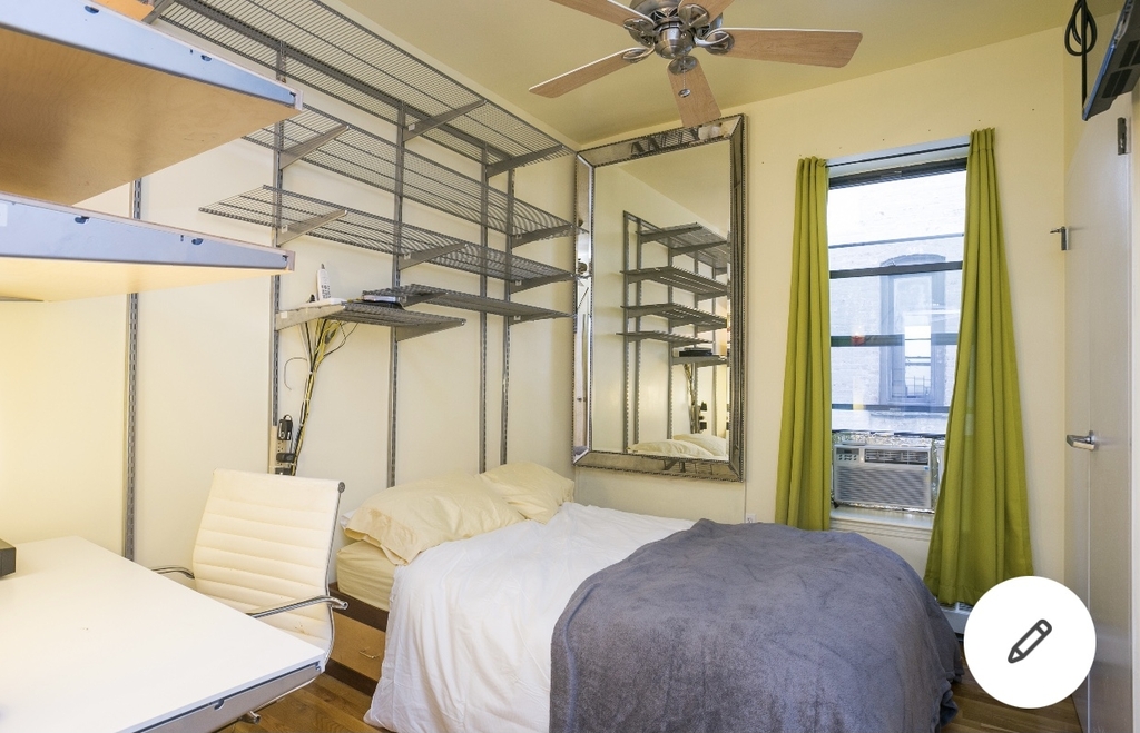 Brooklyn bedroom with a large window