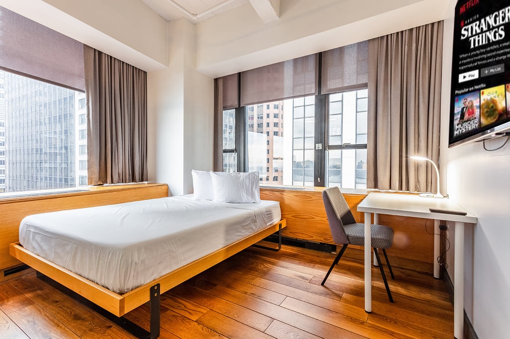 Manhattan bedroom with oversized windows