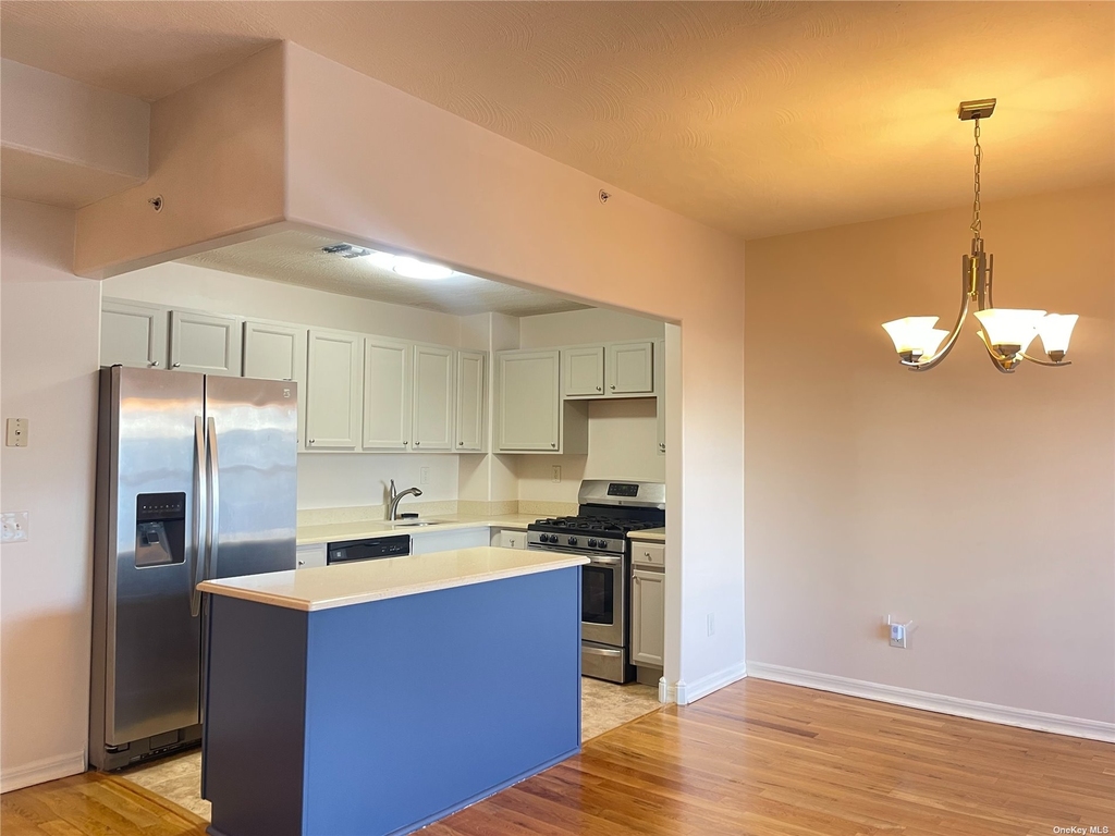 Queens kitchen with stainless steel appliances