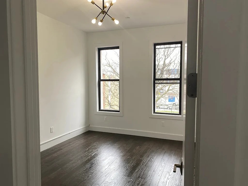 Bedroom with two windows