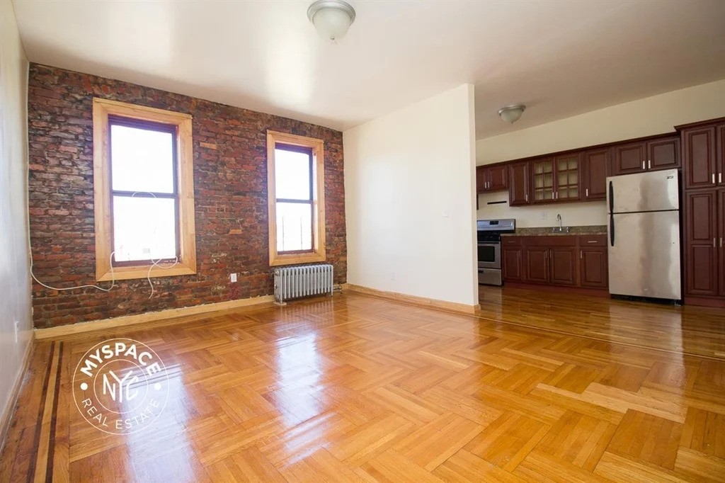 Living room with exposed brick