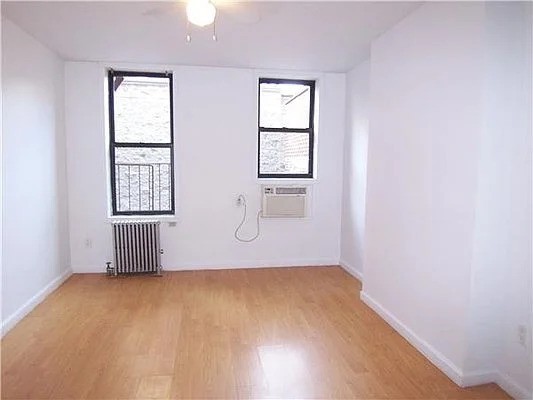 Manhattan bedroom with two windows