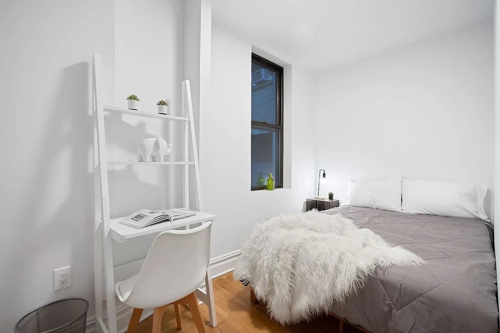 Brooklyn bedroom with a window
