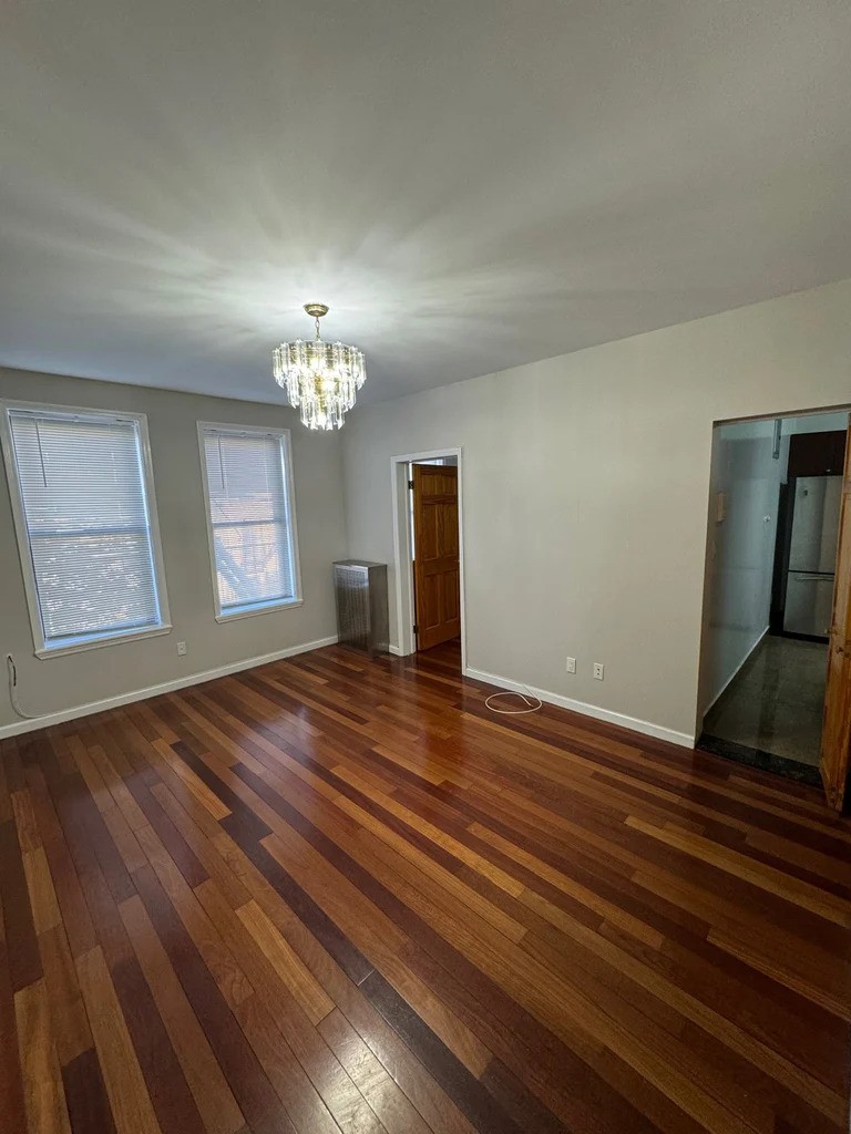 Brooklyn living room with dark hardwood floors