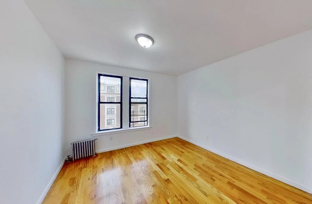 Manhattan bedroom with a window
