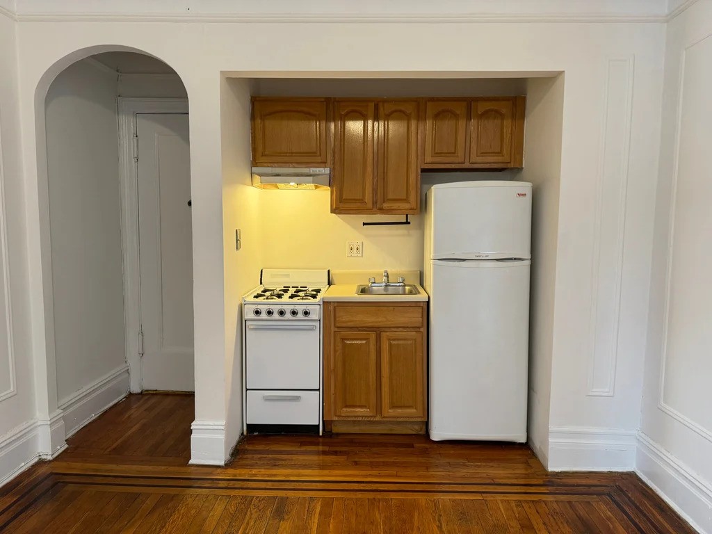 Queens kitchen with white appliances