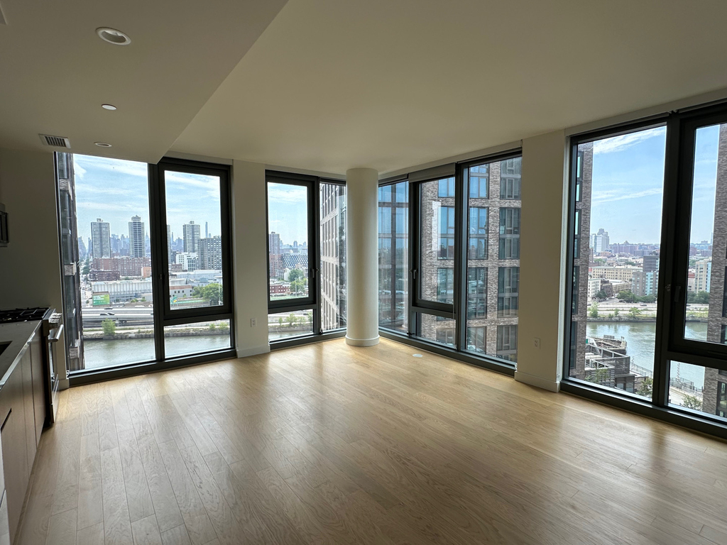 Bronx living room with floor-to-ceiling windows that does not charge a broker fee