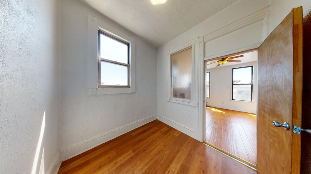 Queens bedroom with natural light