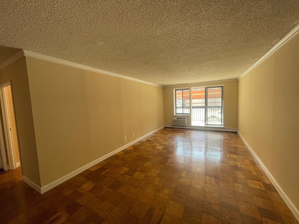 Queens apartment with windows and a terrace