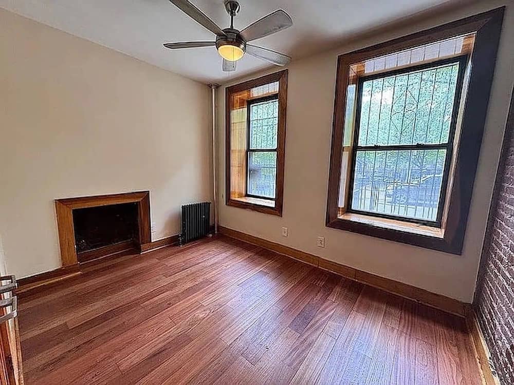 Manhattan listing with exposed brick and fireplace