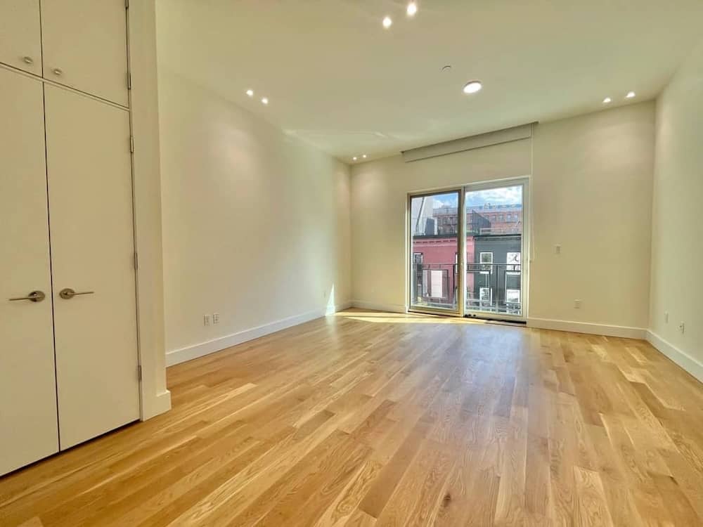 Williamsburg Living Room with Balcony in August 2025