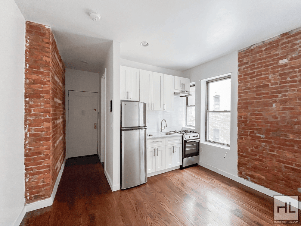 Crown Heights kitchen with exposed brick walls