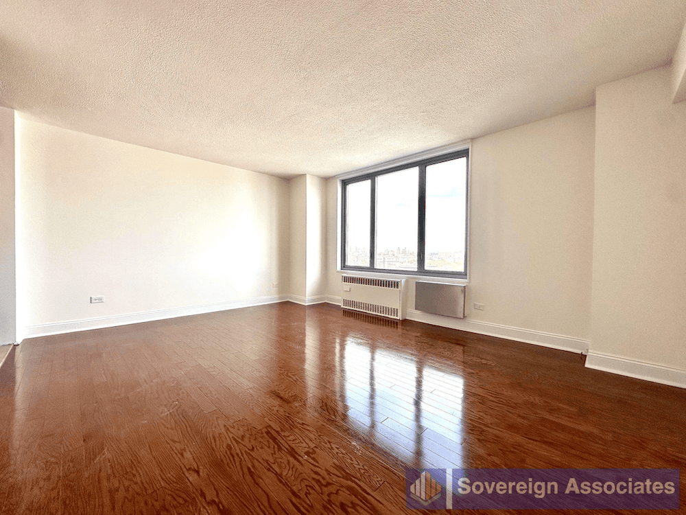 West Harlem apartment with hardwood flooring in December of 2025