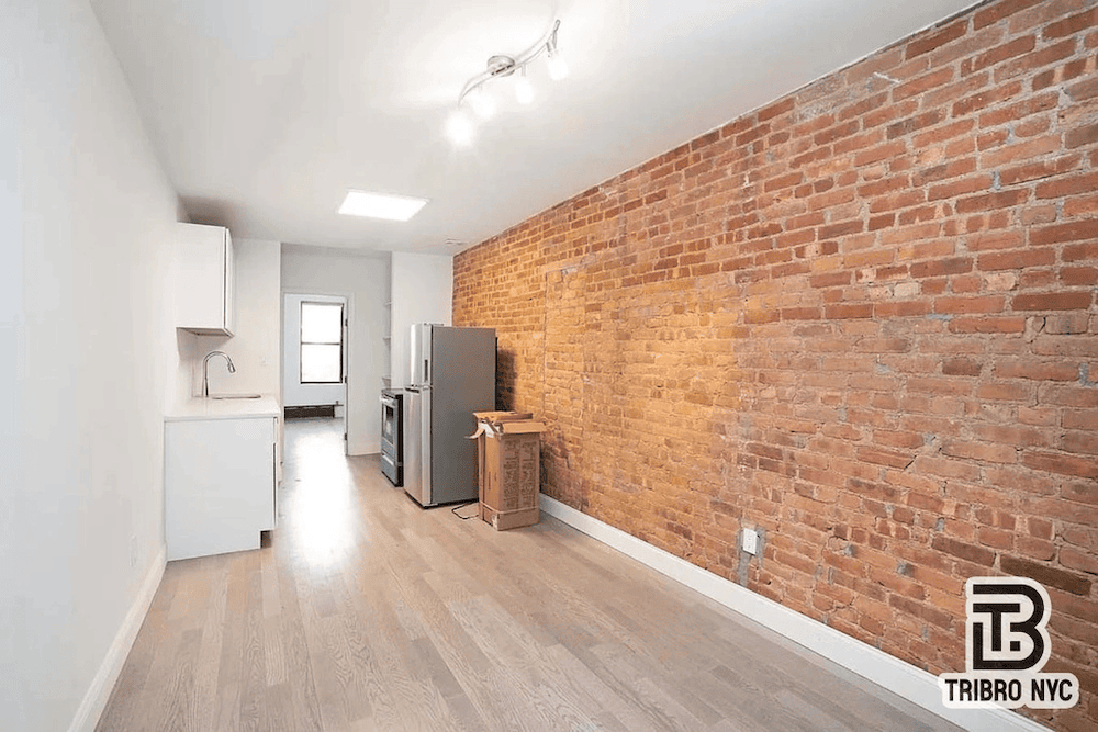 Harlem apartment with two bedrooms and exposed brick in February of 2026