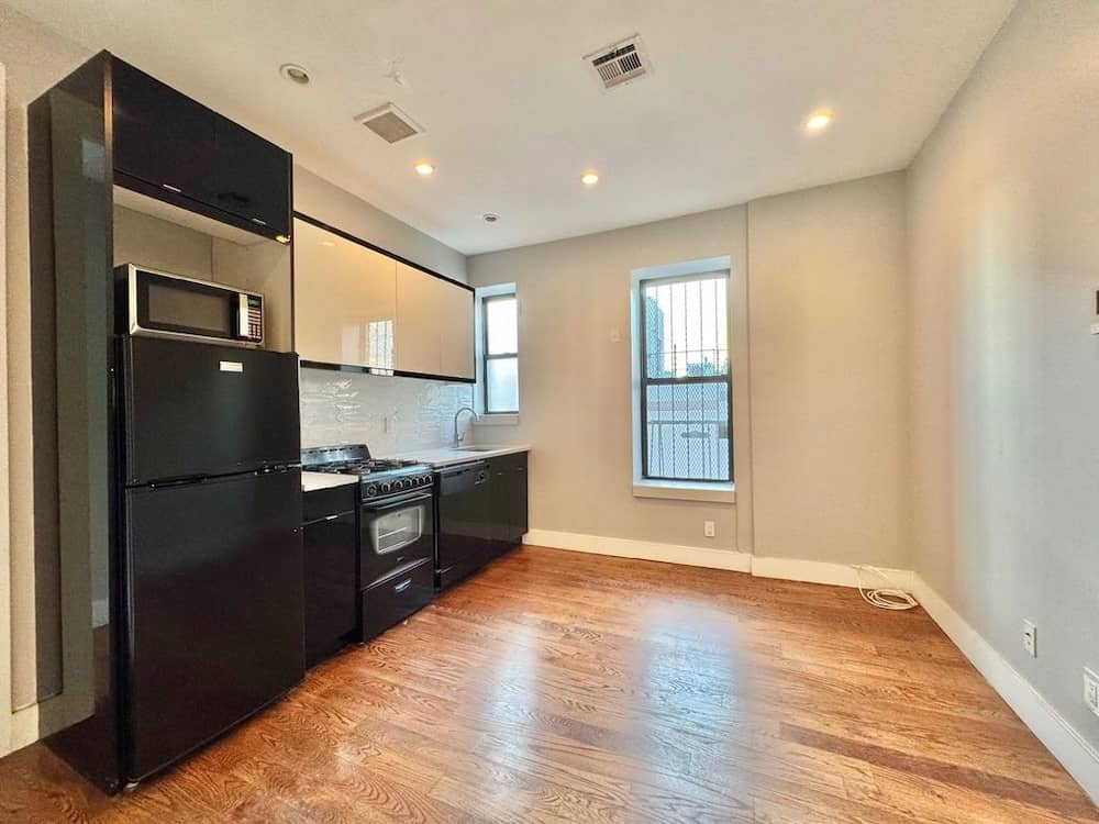 Bed-Stuy apartment with exposed brick walls in April of 2026