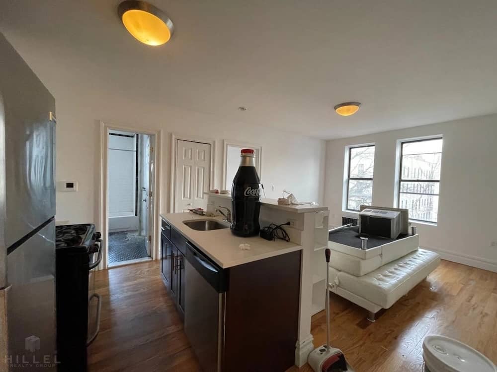 Astoria two bedroom unit with hardwood flooring in August of 2026