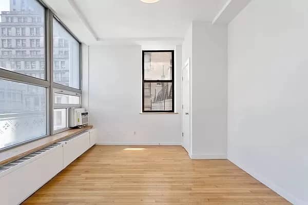Financial District apartment with high ceilings in October of 2026