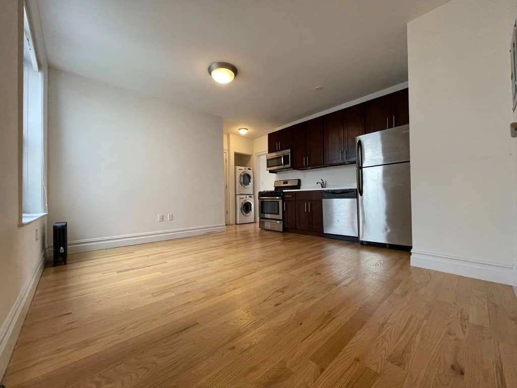 Astoria unit with washer and dryer in September of 2026