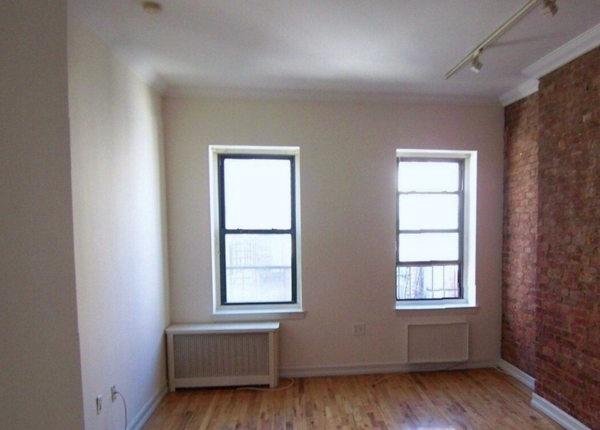 apartment photo of empty bedroom.