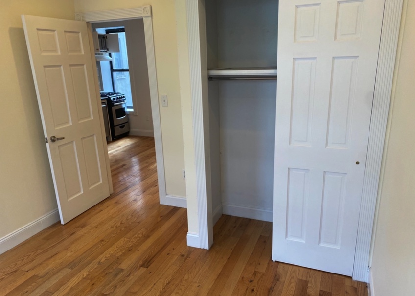 photo of apartment bedroom with closet space