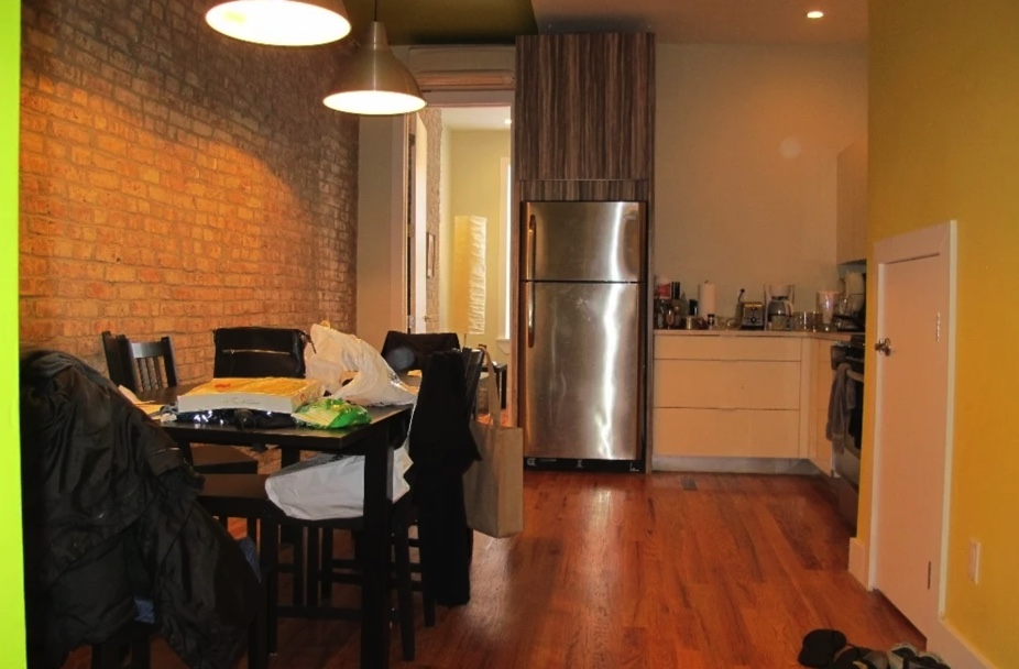 apartment listing photo of kitchen and foyer