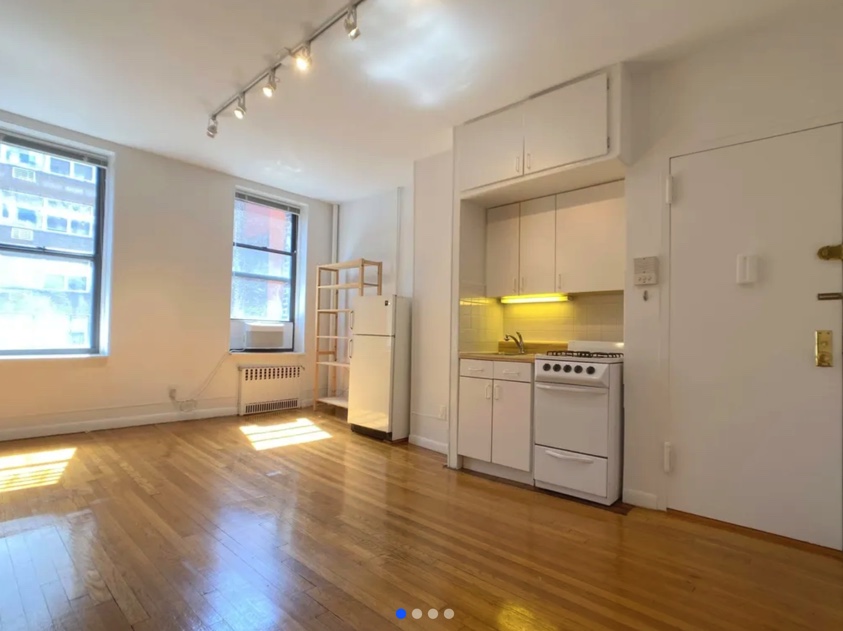 apartment photo empty living space and kitchen