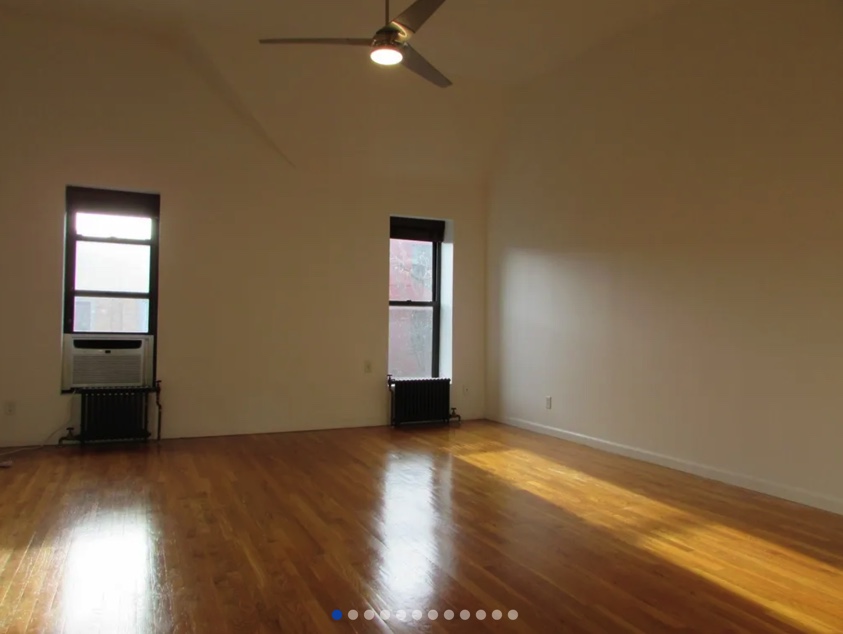 photo of empty room with ceiling fan