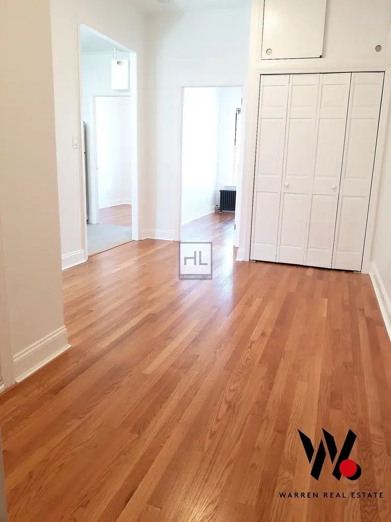 apartment of empty hallway and closet space