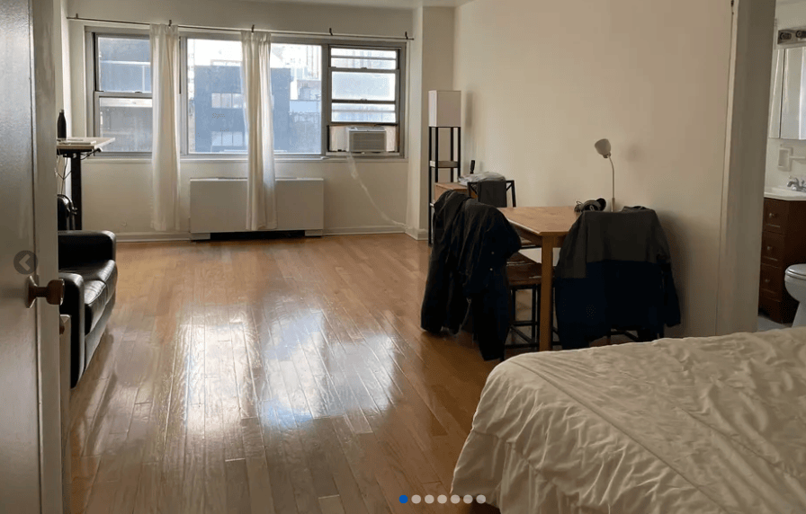 apartment living room with furniture and large windows