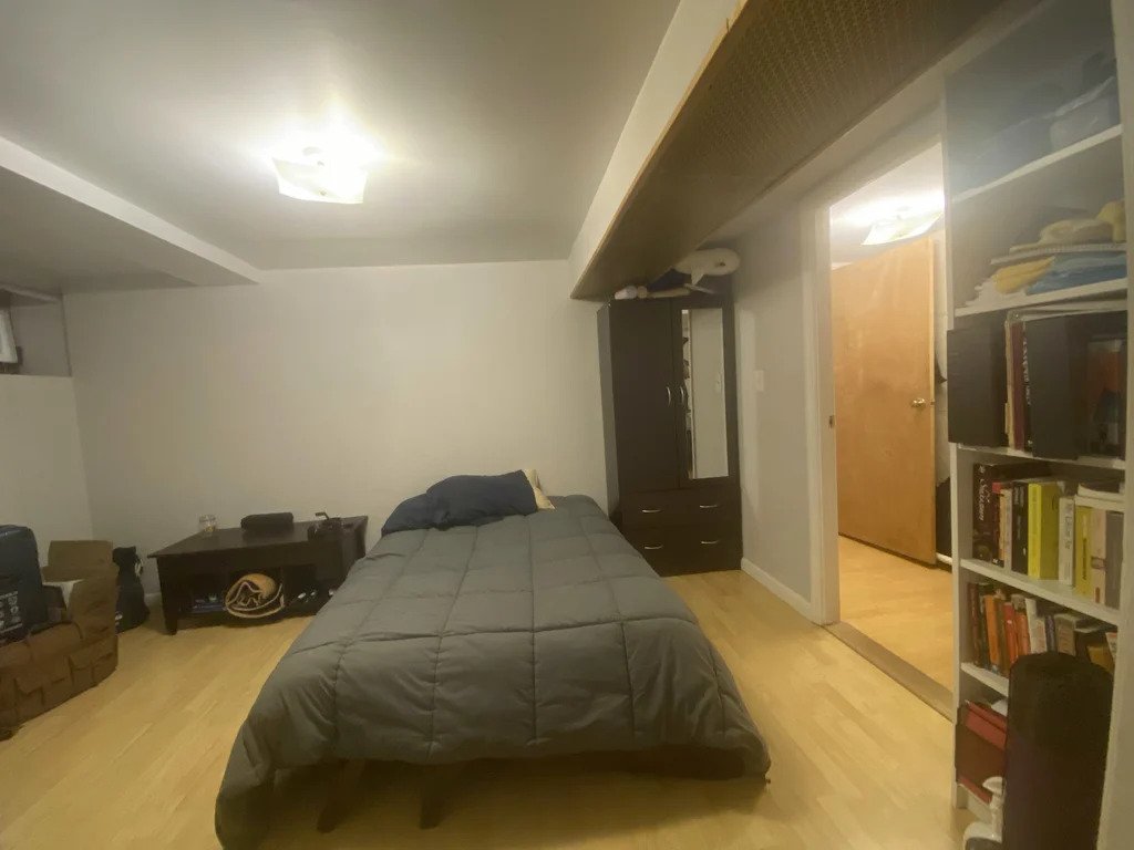 bed in the middle of a bedroom