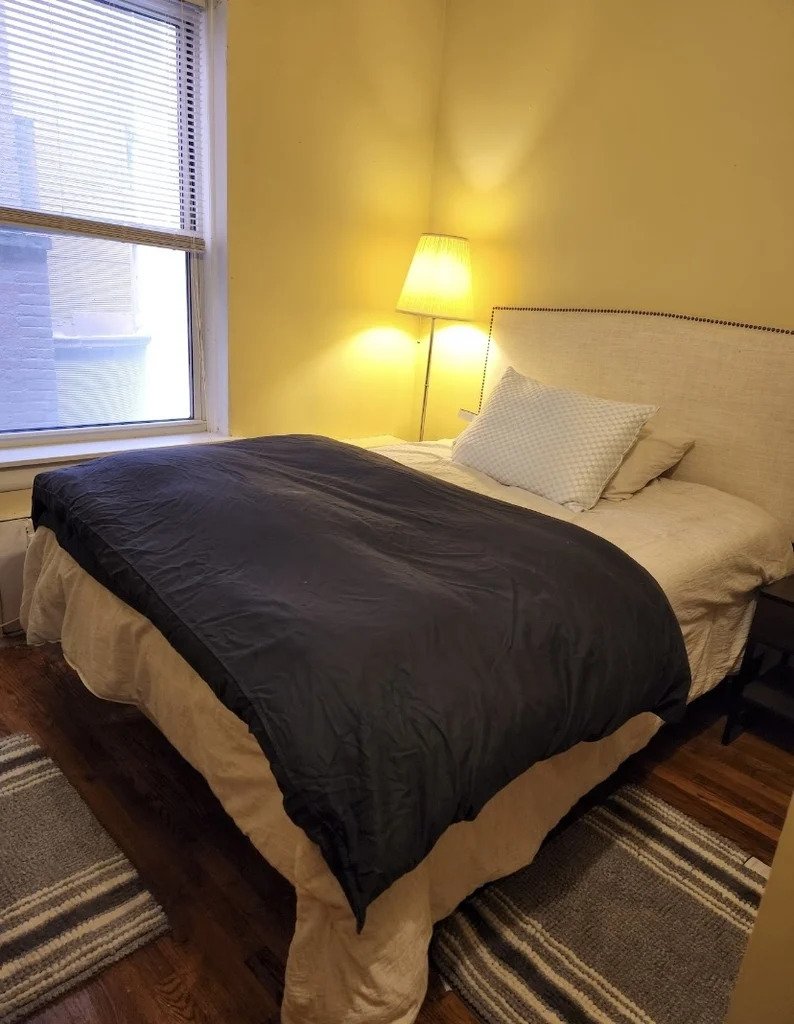 photo of large bed in bedroom