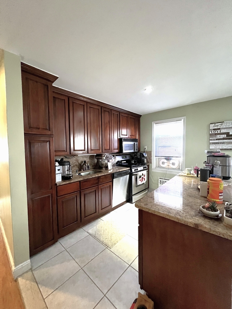 kitchen with island and stainless steel appliances