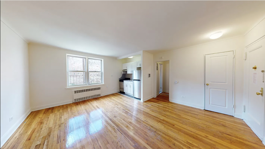 photo of large studio space with a kitchen