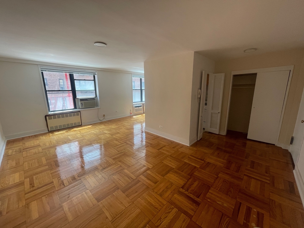 apartment listing photo of an empty alcove studio