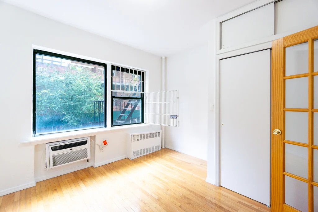 bedroom with large windows