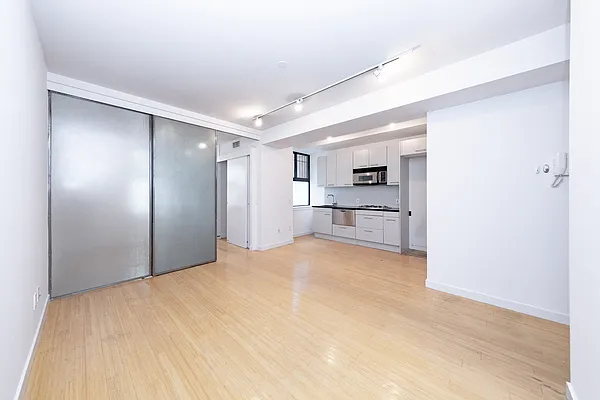 kitchen with sliding door into bedroom