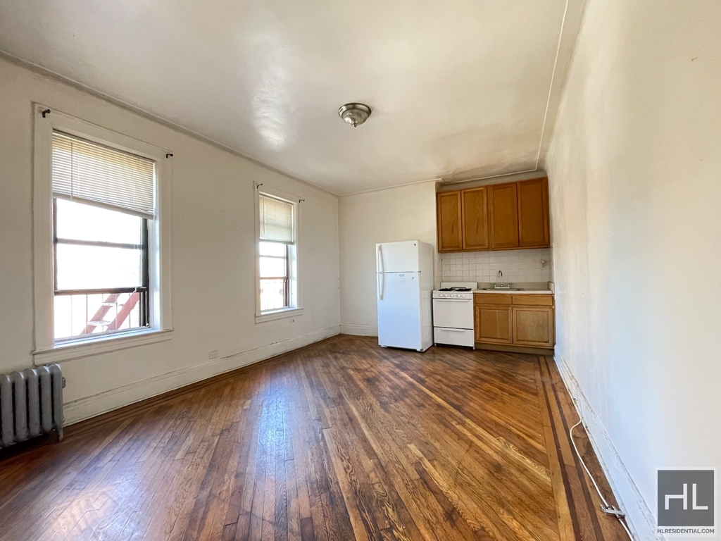 kitchen in brightly lit living room
