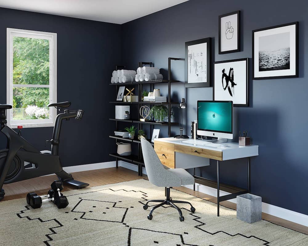 home office with desk, rug, chair, and shelves