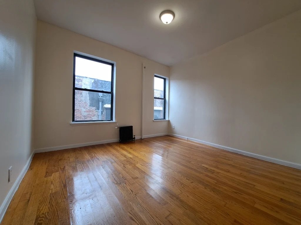 large room with two windows