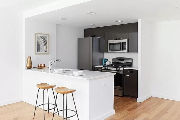 photo of a kitchen with barstools